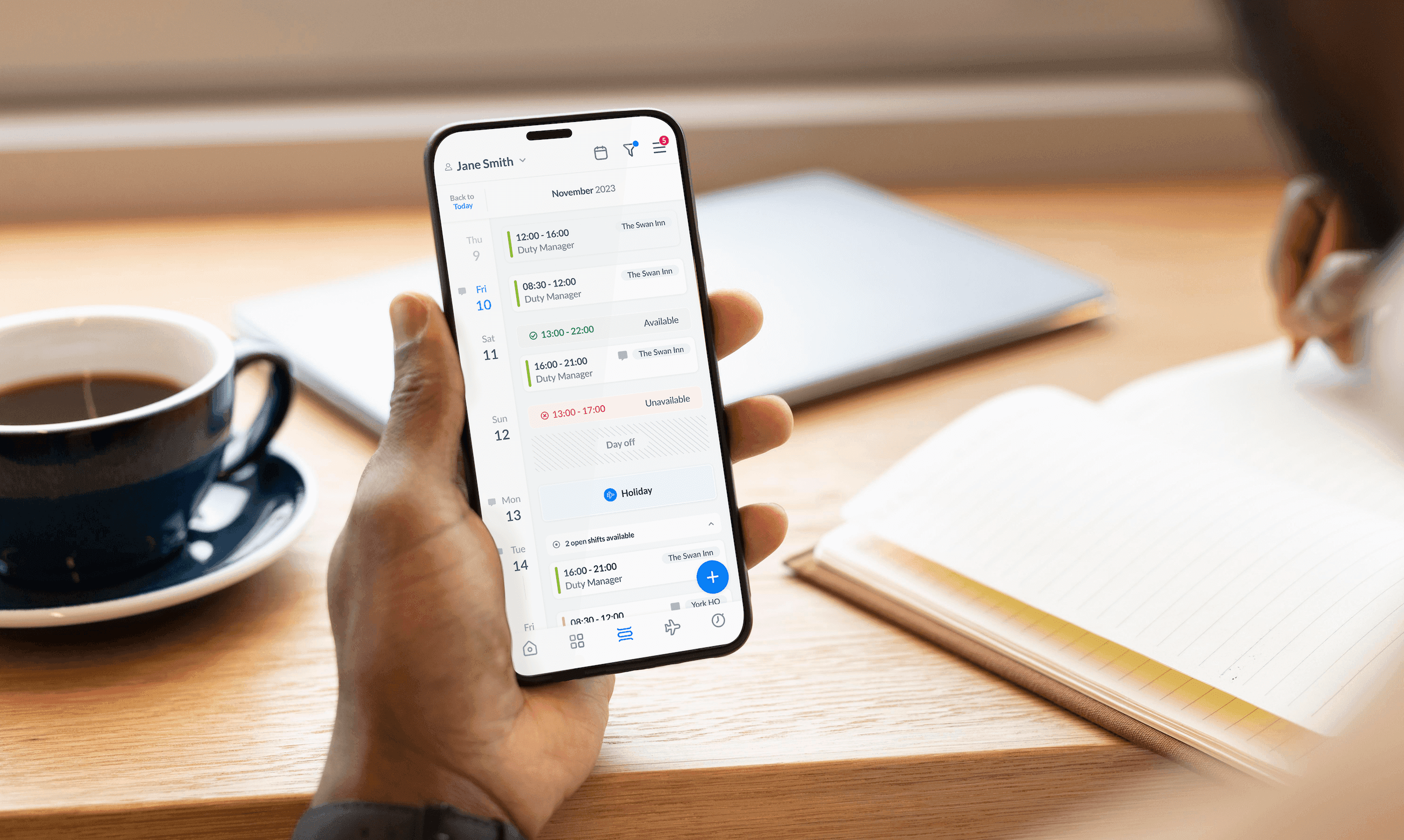 Close-up of a mobile phone in a person's hand running the RotaCloud app